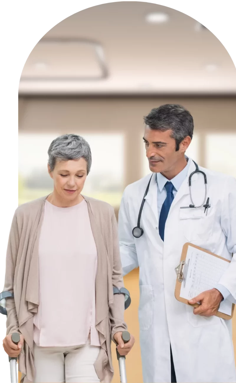 A clinician with a patient at Ayr Medical Group