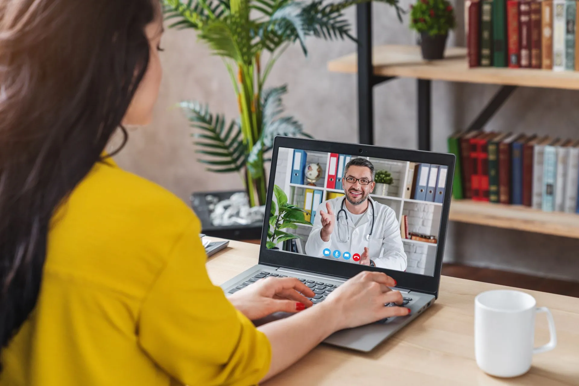 A patient in a video consultation with a doctor