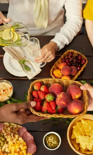 Friends around a summer dinner table