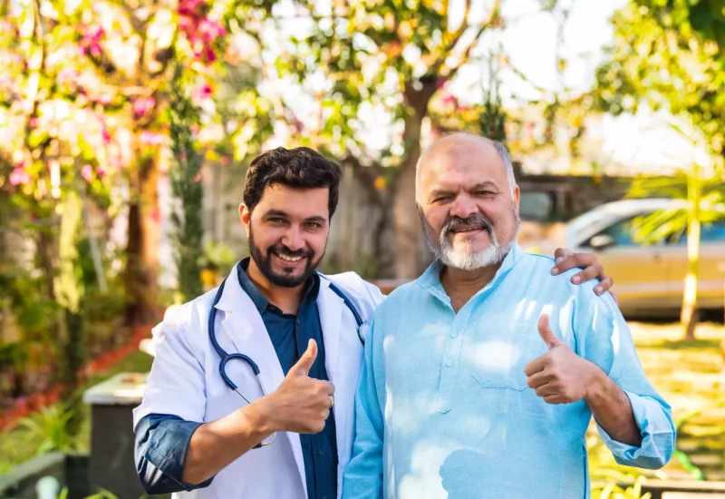 Two doctors outside the practice