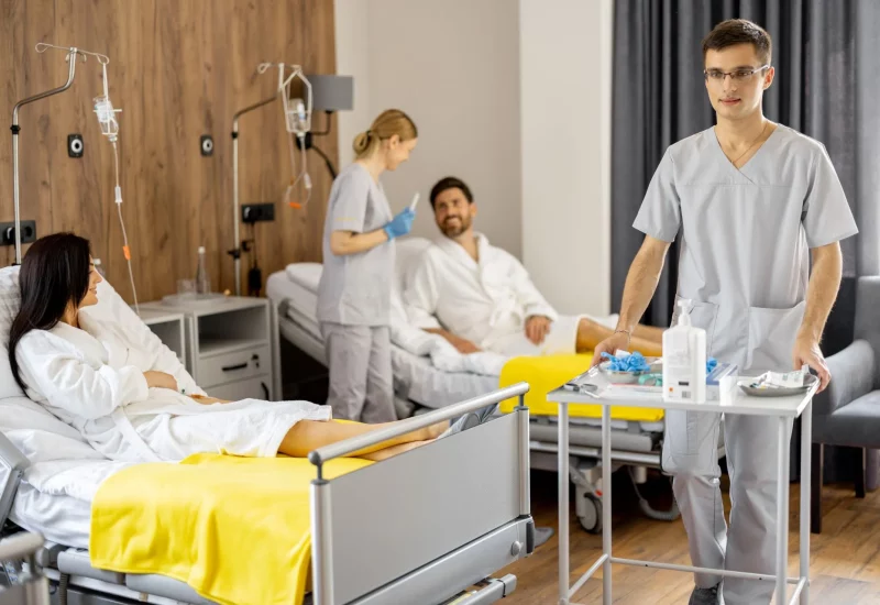 Nurses and patients in a medical ward